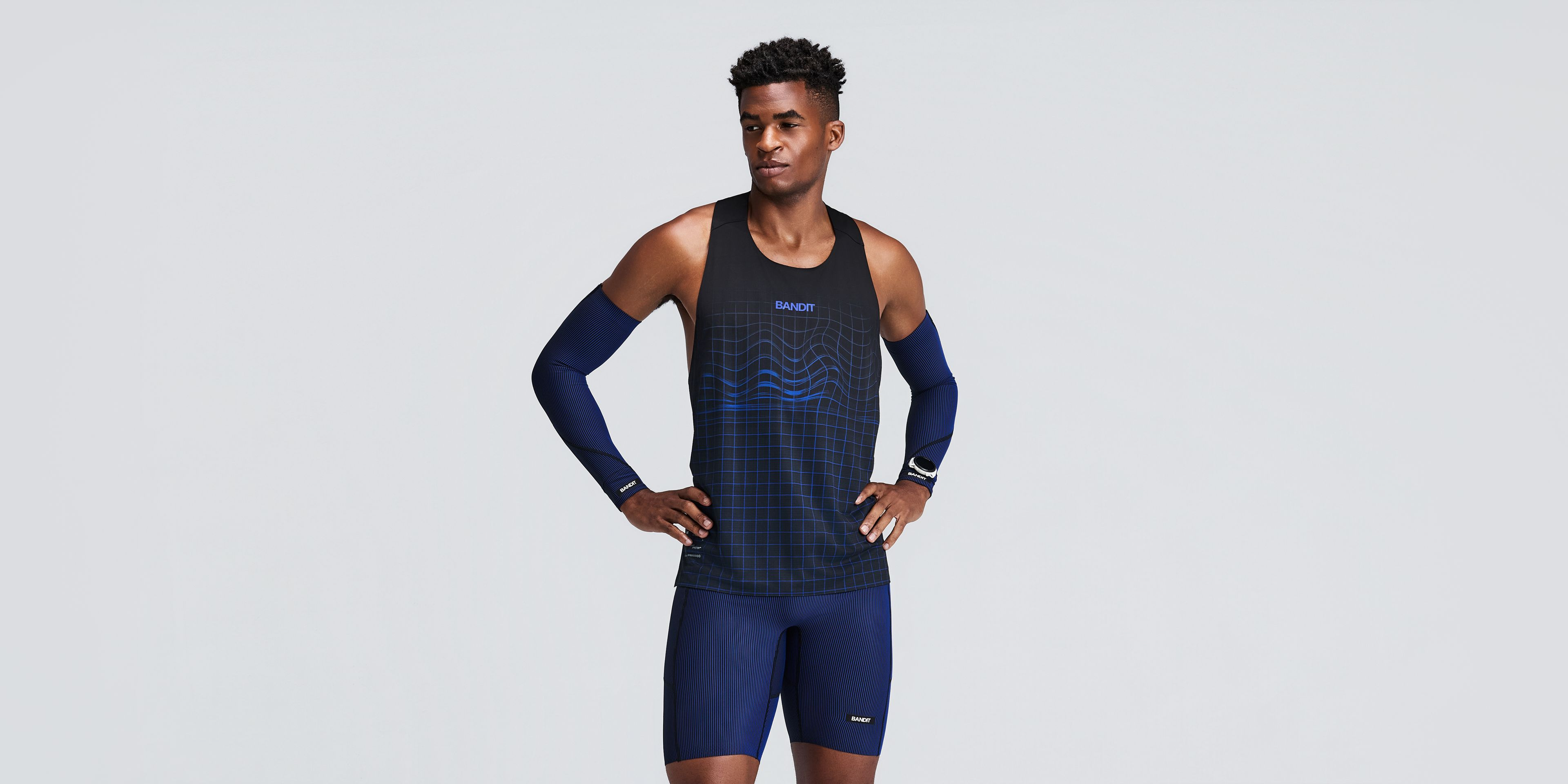 Striped Cadence™ Compression Sleeves - Black / Bauhaus Blue